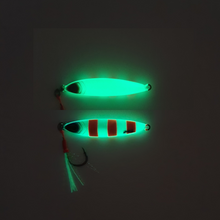 Load image into Gallery viewer, Tungsten Nikka Jigs glowing in the dark. great for attracting fish in the deep. fishing UAE, deep sea fishing, kayak fishing, king fish, queen fish, hammour
